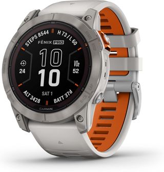 Garmin fēnix 7X Pro Sapphire Solar, Montre Intelligente GPS Multisport, Lampe de Poche intégrée, capacité de Charge Solaire, Gris Brouillard/Orange Ambre